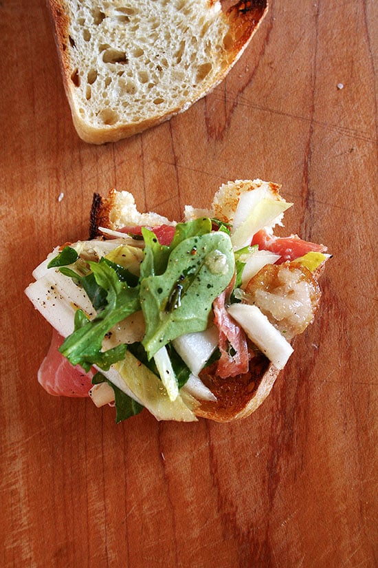 In this endive salad, a combination of salty ham, bitter endive, and topped with Manchego cheese, the pears add a perfect amount of sweetness. A tarragon-shallot vinaigrette, I find makes the perfect dressing for this simple salad. // www.simonrockett.com 在这个菊苣沙拉、火腿、咸的结合苦菊苣,顶部有格乳酪芝士梨添加一个完美的甜蜜。tarragon-shallot醋,我发现完美的为这个简单的沙拉酱。/ / www.simonrockett.com