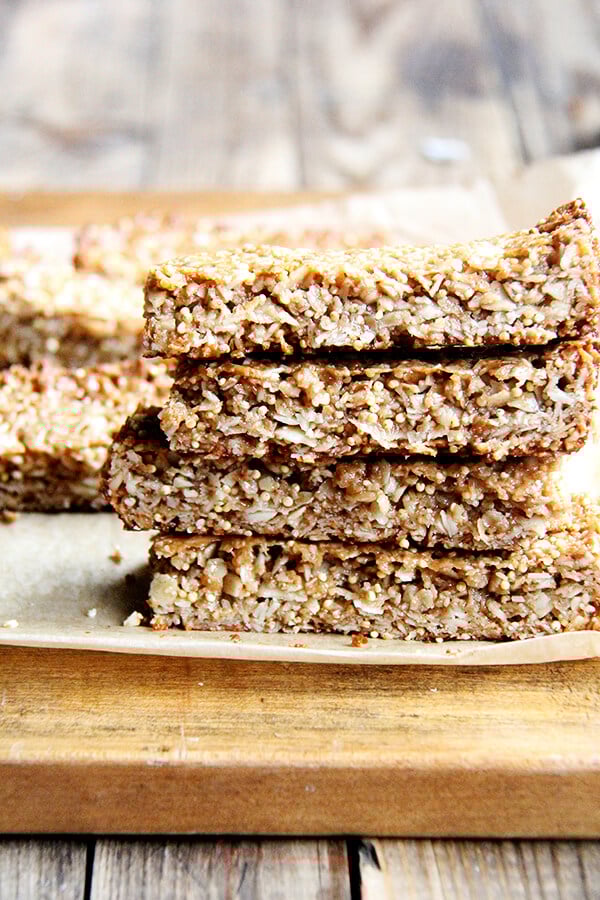 In these granola bars, I use oats, coconut, almonds and millet for the dry ingredients, the same makeup as the granola. For the glue, I use coconut oil or butter, maple syrup, brown rice syrup and almond butter. They hold their shape at room temperature and have thus become a lunch box staple. // www.simonrockett.com In these granola bars, I use oats, coconut, almonds and millet for the dry ingredients, the same makeup as the granola. For the glue, I use coconut oil or butter, maple syrup, brown rice syrup and almond butter. They hold their shape at room temperature and have thus become a lunch box staple. // www.simonrockett.com
