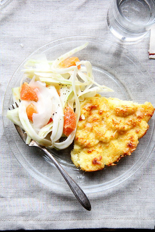 Made with milk, semolina flour, parmesan and egg yolks, this baked semolina gnocchi bears little resemblance to potato gnocchi. They taste more like polenta in fact, but are lighter in texture. In addition to being incredibly delicious, the beauty of gnocchi alla Romana is that it can be completely assembled ahead of time — up to two days — and baked just before serving. // www.simonrockett.com 用牛奶、粗面粉、帕尔玛和蛋黄,这烤粗粒小麦粉汤圆相似性很小土豆团子。味道更像玉米粥事实上,但质地更轻。除了非常美味,汤圆的美丽真主安拉的和平是它可以提前完全组装,两天,烤前服务。/ / www.simonrockett.com