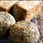 Quinoa-flax toasting bread on a cooling rack.