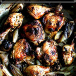 一盘烤鸡和青葱。