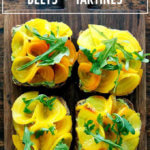 董事会与甜菜和鳄梨tartines。