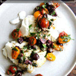 烤鳕鱼与西红柿、酸豆和欧芹。