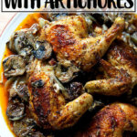 一盘烤鸡日期和洋蓟心。